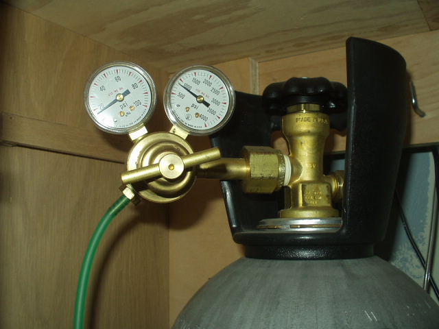 Here's the regulator.  I wanted this picture to be second, but forgot it altogether and had to edit it in,which placed it first.  I have a standard industrial 20lb. tank from Roberts Oxygen, which has already lasted 3 years.  Cheap!